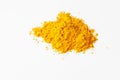 A pile of turmeric spice powder on a white background Royalty Free Stock Photo