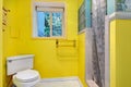 Bright yellow bathroom interior