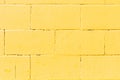 Bright yellow concrete bricks background texture Royalty Free Stock Photo