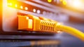 Bright yellow ethernet cable connecting computer to the network yellow