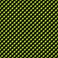 Bright yellow and green diagonal seamless pattern on black background