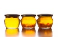 Bright yellow jam - dandelion flower honey in glass jars on whit Royalty Free Stock Photo