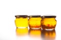Bright yellow jam - dandelion flower honey in glass jars on whit Royalty Free Stock Photo