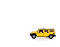 A bright, yellow jeep on a white background