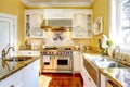 Bright yellow kitchen room with granite tops Royalty Free Stock Photo