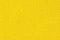 Bright yellow leather background with imitation weave texture. Glossy dermantine, artificial leather structure