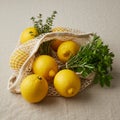 Bright Yellow Lemons and Fresh Herbs in Mesh Bag Royalty Free Stock Photo