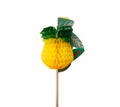 A cocktail garnish, a pineapple made from paper and a toothpick, decoration in cocktails on a white background.