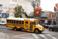 Bright yellow school bus on the road in Los Angeles