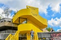 The exterior of the bright yellow Southbank Centre on the Southbank