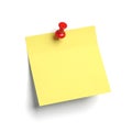 Bright yellow sticky note pinned with a red thumbtack ready for important messages Royalty Free Stock Photo