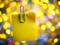 Bright Yellow Sticky Notes with Paperclip on a Blurred Background A Creative and Motivational Image for Your Design Royalty Free Stock Photo