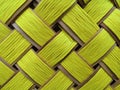 Bright yellow texture squares in a wicker basket background Royalty Free Stock Photo