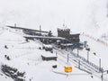 Bright, Yellow Train at the Snowy Zermatt Ski Resort in Switzerland. Royalty Free Stock Photo