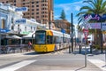 Bright yellow tramway on Moseley square. Glenelg, Australia