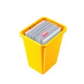 Bright yellow waste bin filled with paper cards featuring black and white patterns and a pink accent white background Royalty Free Stock Photo