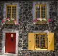 Bright Yellow windows and a red door Royalty Free Stock Photo
