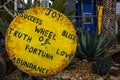 A Bright Yellow Wooden Wheel of Truth and Love Royalty Free Stock Photo