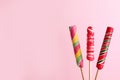 Bright yummy candies on color background. Royalty Free Stock Photo