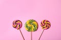 Bright yummy candies on color background Royalty Free Stock Photo