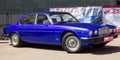 Brightly blue British luxery car Jaguar X-Type