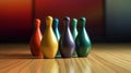 Colored bowling pins on wooden floor Royalty Free Stock Photo