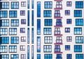 A brightly colored facade of a residential building. Abstract background of colored windows