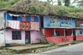 Brightly colored houses in the Ecuadorian jungle Royalty Free Stock Photo