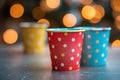 brightly colored paper cups on a table