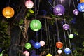 A brightly colored paper lantern hung unde