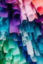 Colorful paper ruffles create a vibrant and artistic backdrop in a creative space Royalty Free Stock Photo