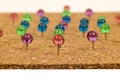 Brightly Colored Pushpins In Cork Royalty Free Stock Photo