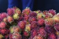 Brightly colored Rambutan fruit pile