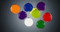 Brightly colored spheres suspended in a gradient gray environment with subtle lighting Royalty Free Stock Photo