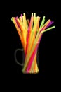 Brightly colored straws isolated on black Royalty Free Stock Photo