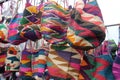 Brightly colorful crocheted traditional baskets for sale at Otavalo market in Ecuador