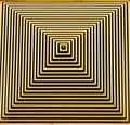 Brightly coloured abstract square in gold and black