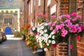 Brightly coloured floral baskets in the pretty English floral village of Croston Royalty Free Stock Photo