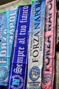Brightly coloured football scarves for sale Naples Italy 