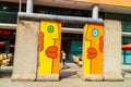 Brightly coloured graffiti on a segment of the original Berlin Wall. Royalty Free Stock Photo