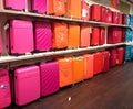 Brightly coloured luggage.