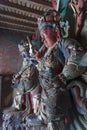 Brightly coloured statues of Tibetan deities inside the Buddhist Kumbum chorten in Gyantse in the Pelkor Chode Monastery - Tibet