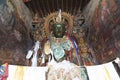 Brightly coloured statues of Tibetan deities inside the Buddhist Kumbum chorten in Gyantse in the Pelkor Chode Monastery