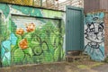 Brightly coloured street art on a garage door