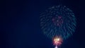 Brightly colourful firework in the night sky with copy space - Abstract holiday background