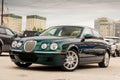 Brightly green Jaguar S-type 2007 front view Royalty Free Stock Photo