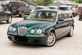 Brightly green Jaguar S-type 2007 front view Royalty Free Stock Photo