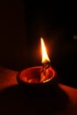 Brightly lit earthen lamp during Diwali Royalty Free Stock Photo