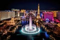 The brightly lit fountains of the Las Vegas Strip create a dazzling spectacle at night, View of the Bellagio Fountains and The