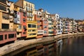 The brightly painted facades of the houses looking over the River Onyar in the ancient centre of Gerona Royalty Free Stock Photo